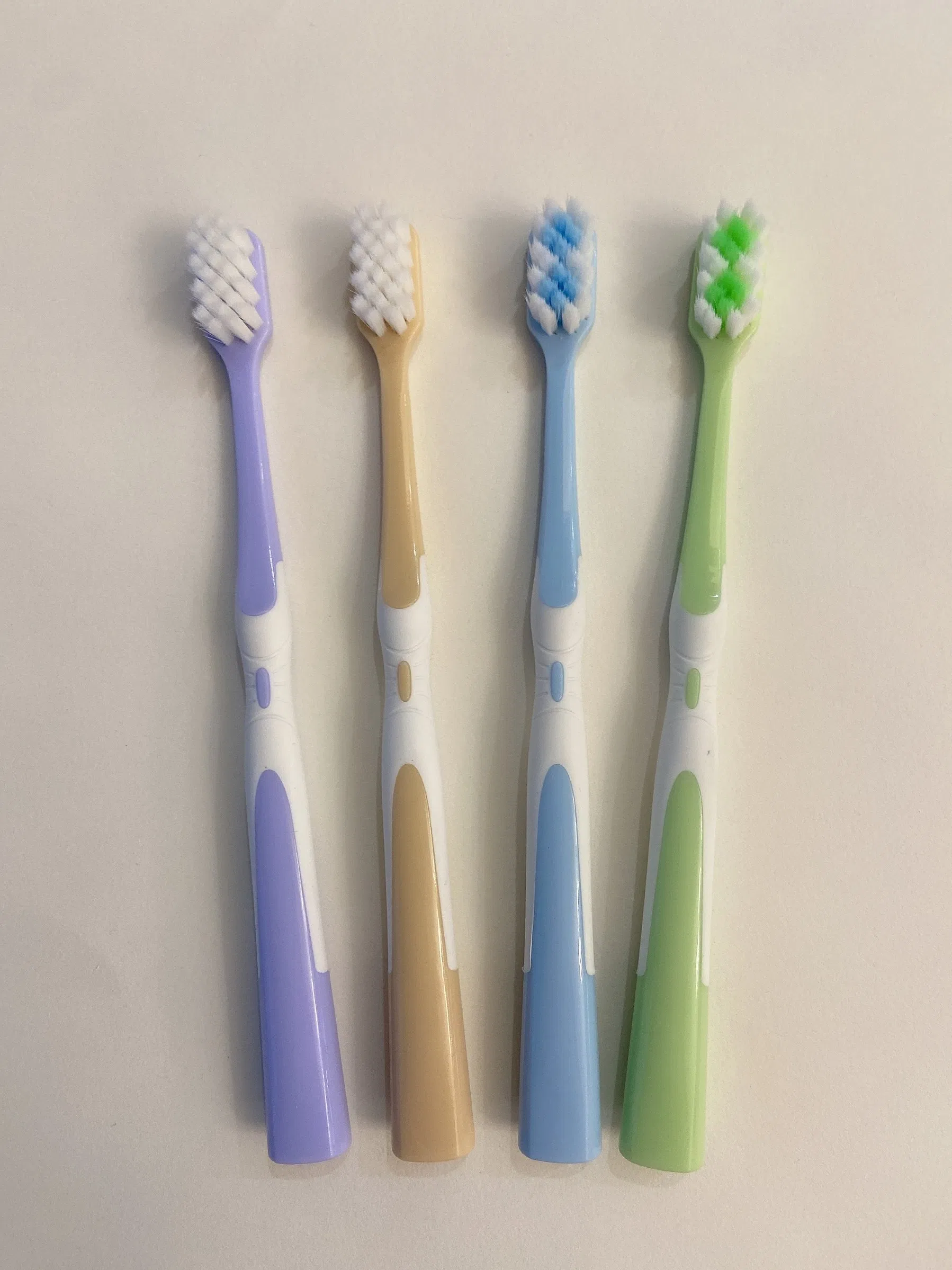 FDA Ultra Soft Square Tufting Holes PP+TPE Adult Toothbrush