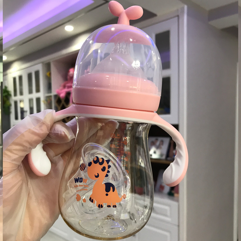 Newborn Baby with a Pipe Bottlebring a Handle Pipe Pacifier