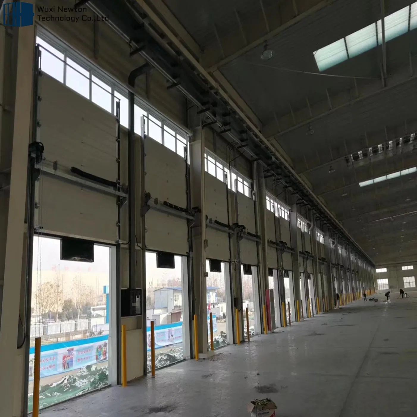 China Supplier Large Size Heat Insulation Industrial Workshop Door with Pedestrian Door