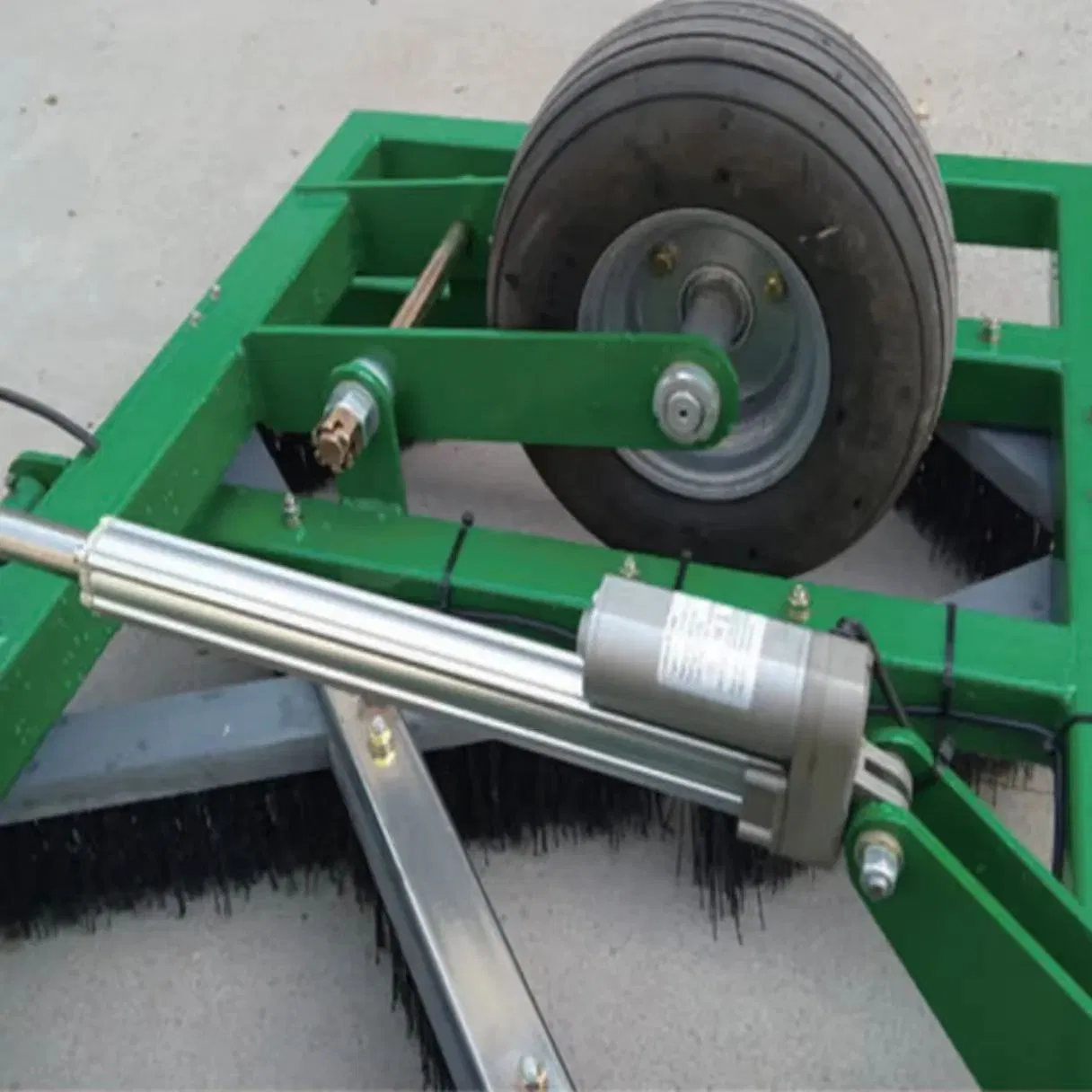 Adjustable Trailed Grass Brush for Efficient Lawn Debris Removal