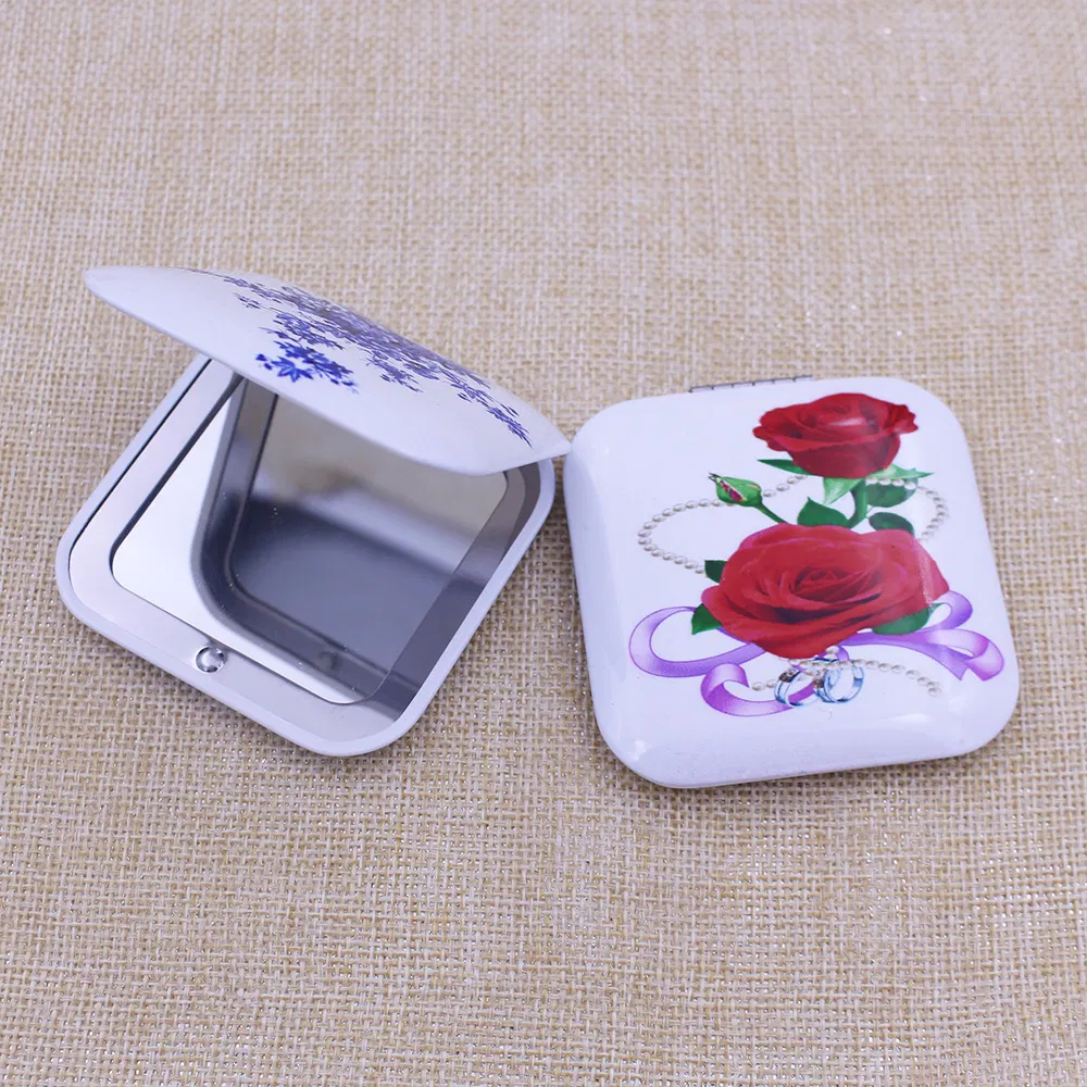 Elegant Metal Pocket Mirror with Reflective Cosmetic Surface
