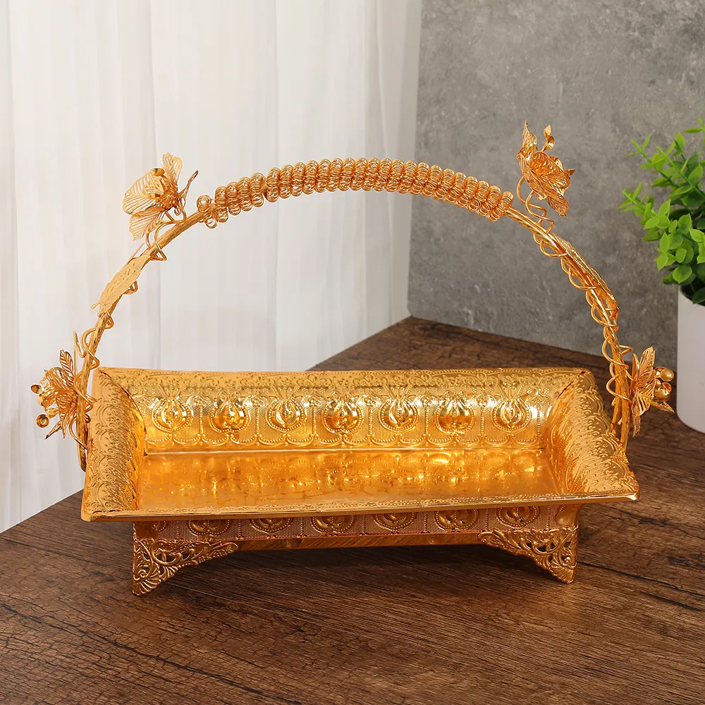 Golden Plates Are Used to Hold Food, Party, and Large Metal Trays for Decoration