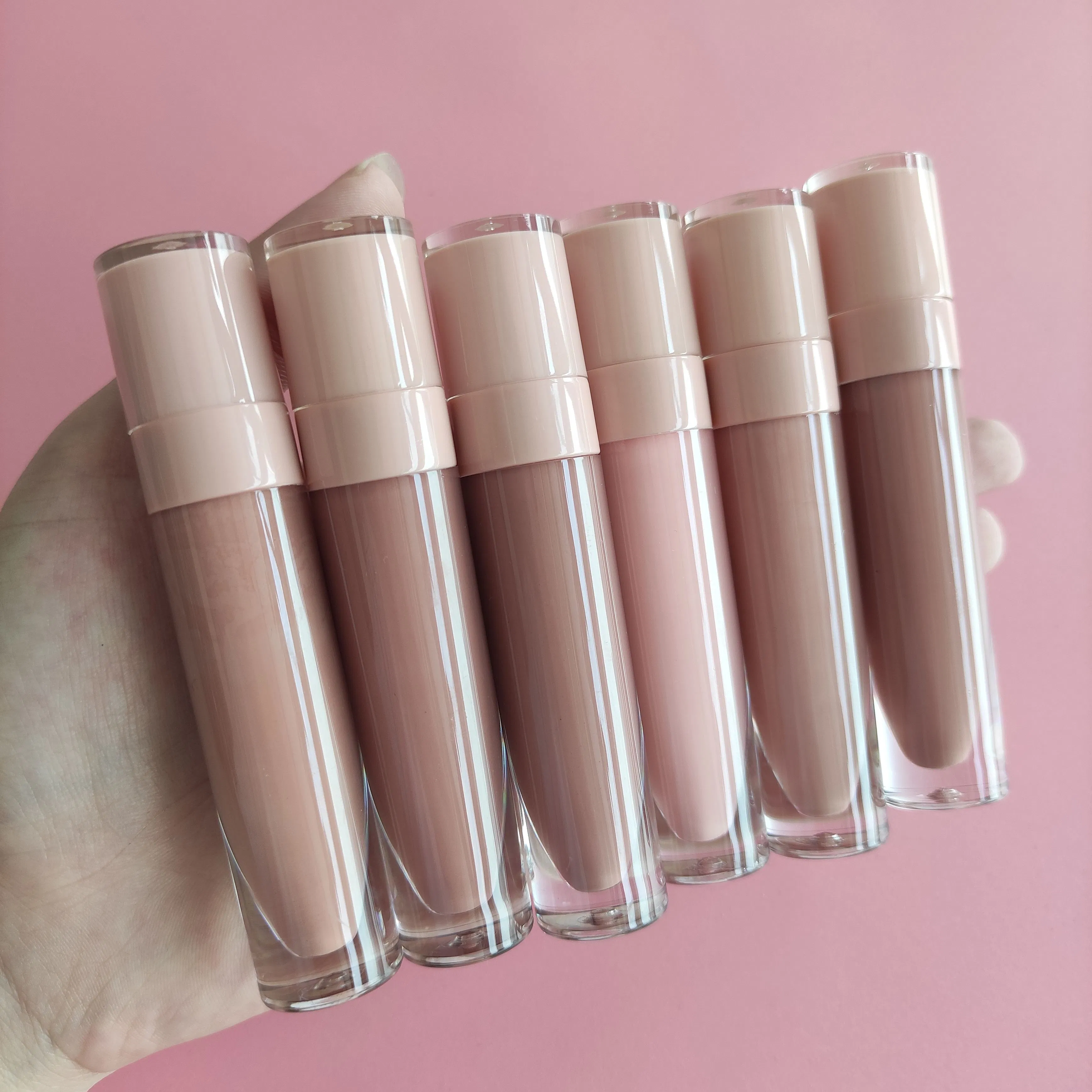 Wholesaler Cosmetics Vanilla Flavor Shiny Effect Vegan Nude Tube Dusty Pink Blush Pink Lip Gloss for Winter Season