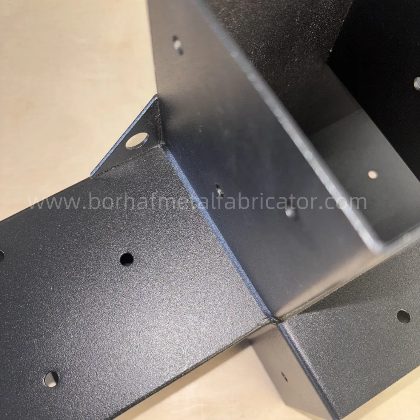 Custom Cut Galvanized Steel Brackets Connecting Wood Beams in Outdoor Pavilions