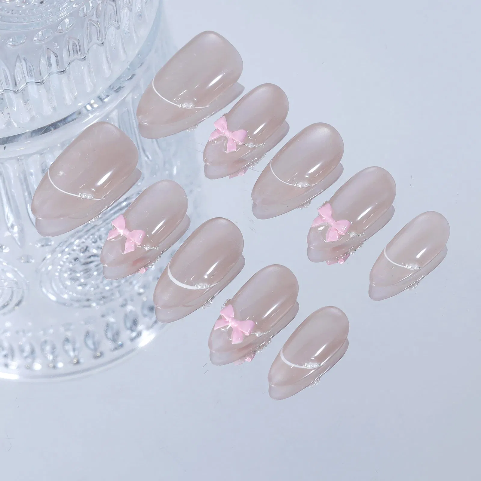 Elegant Pink Bow Press-on Almond Nails with Silver Accents