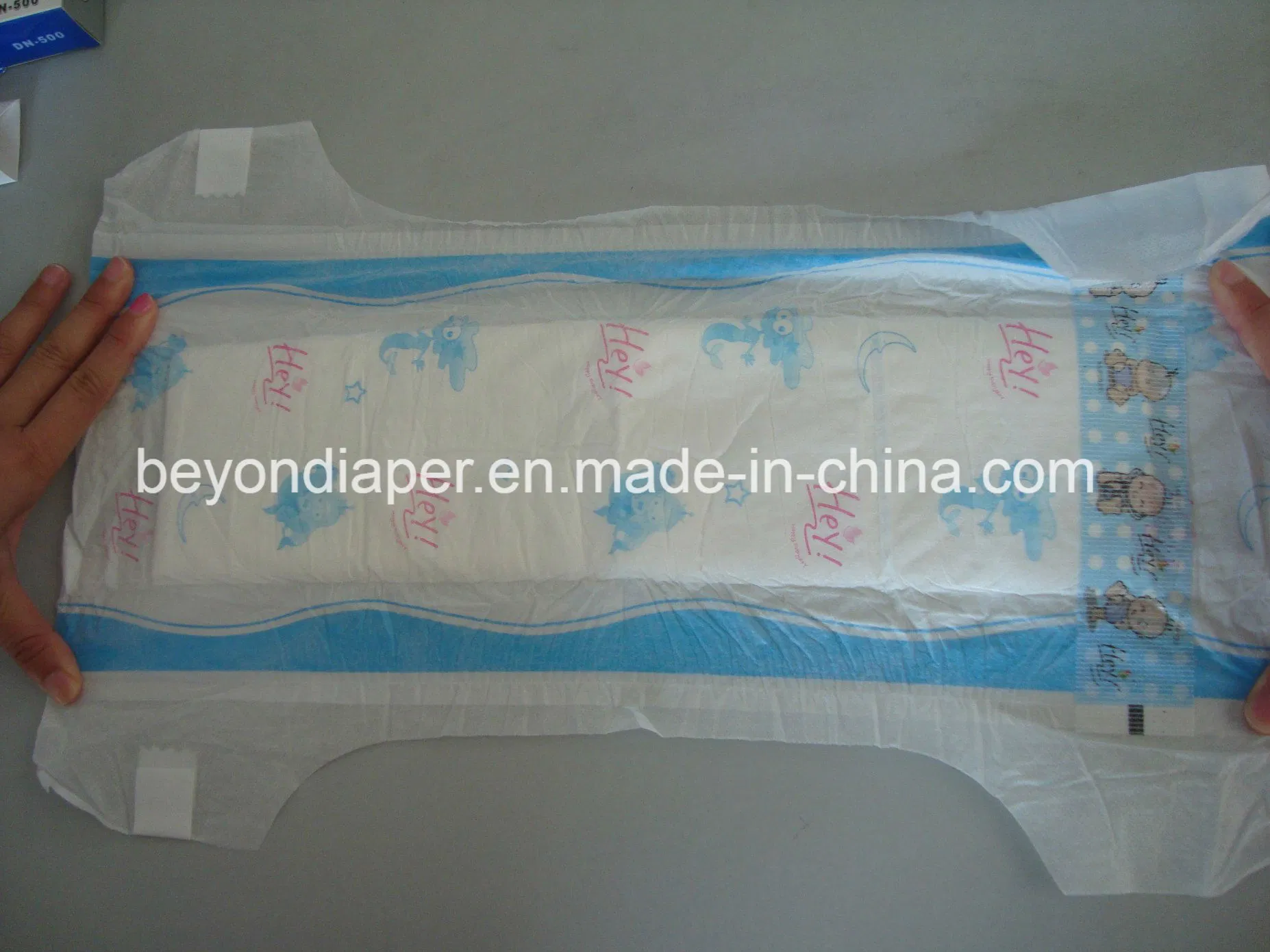 Cloth-Like Baby Diaper with Magic Tape and Blue Adl in The Middle