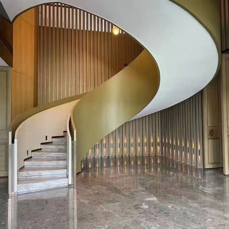 Stylish Indoor Floating Staircase with Curved Wooden Handrail