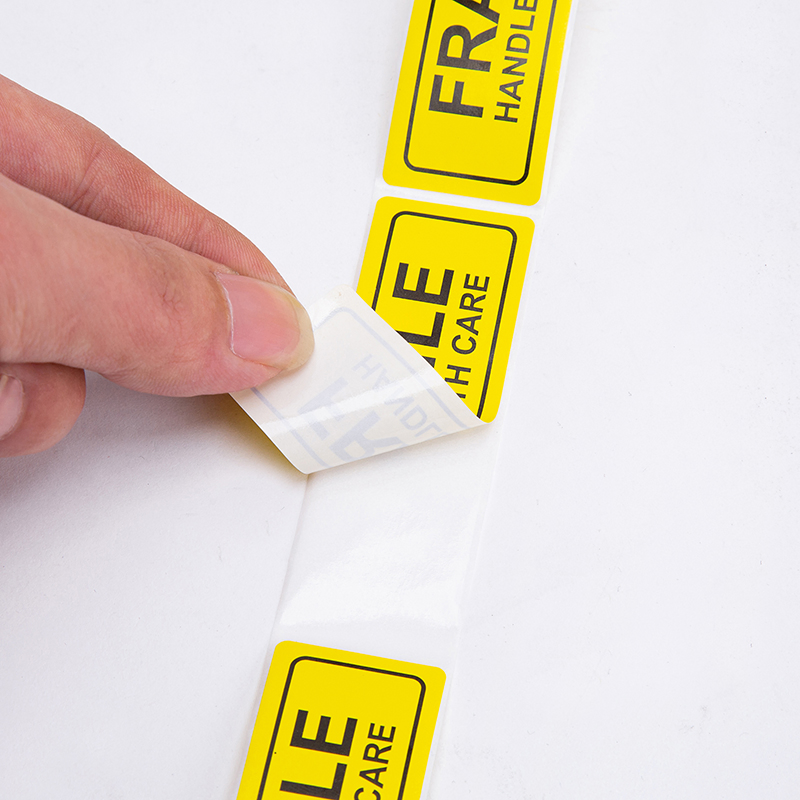 Large Roll of Coated Paper Self-Adhesive Logistics Transportation Fragile Warning Label Sticker