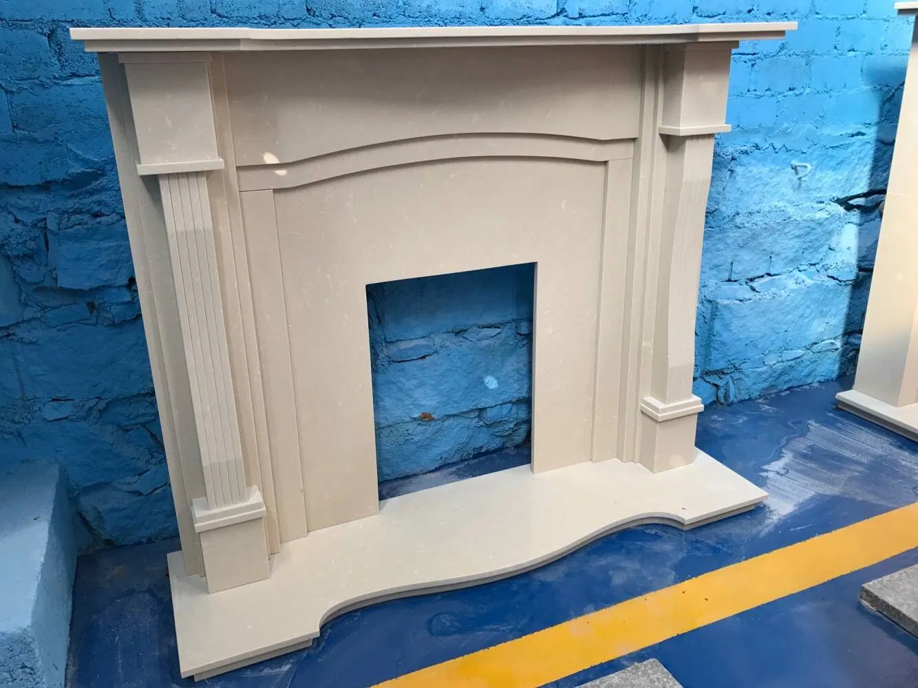 China Wholesale Interior Decoration Modern Style Hand Made Carved Artificial Stone Marble Fireplace Mantel Design Price