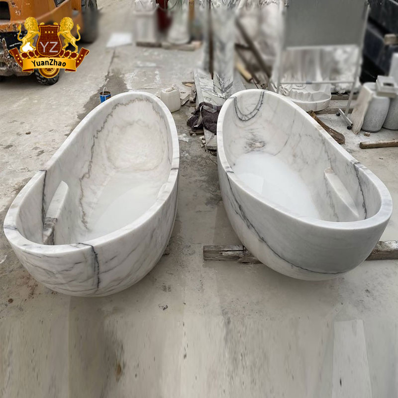 Белая мраморная ванна фристейдинг с гидромассажем