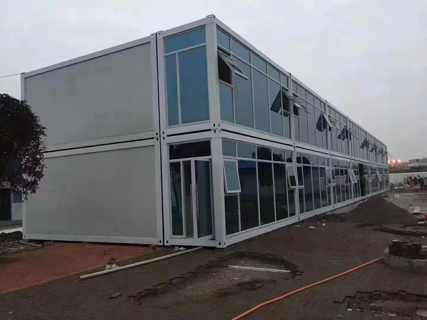 Prefab Container Homes Construction Site Worker Living Prefabricated Steel Structure Flat Pack Container House Caravan Bungalow