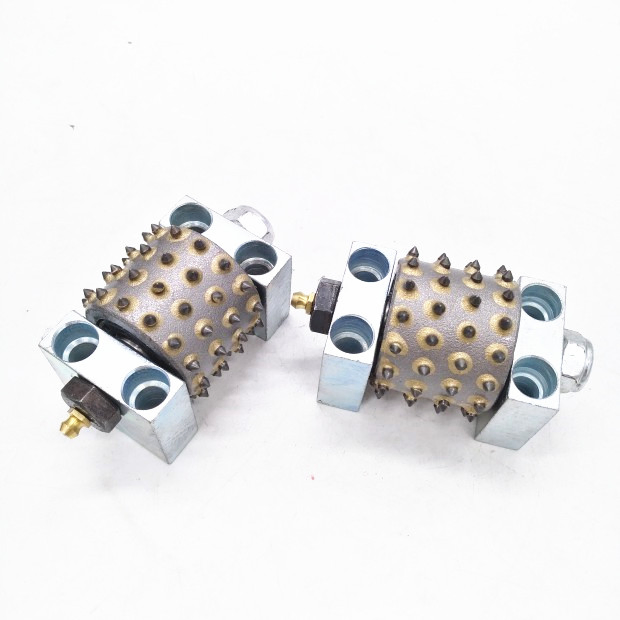 240mm Diamond Bush Hammered Rollers on Klindex Grinder