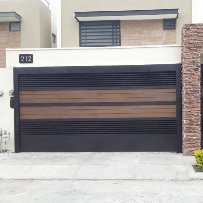 Stylish High - Quality Dark - Colored Car Garage Door with Wooden Accents, Customizable