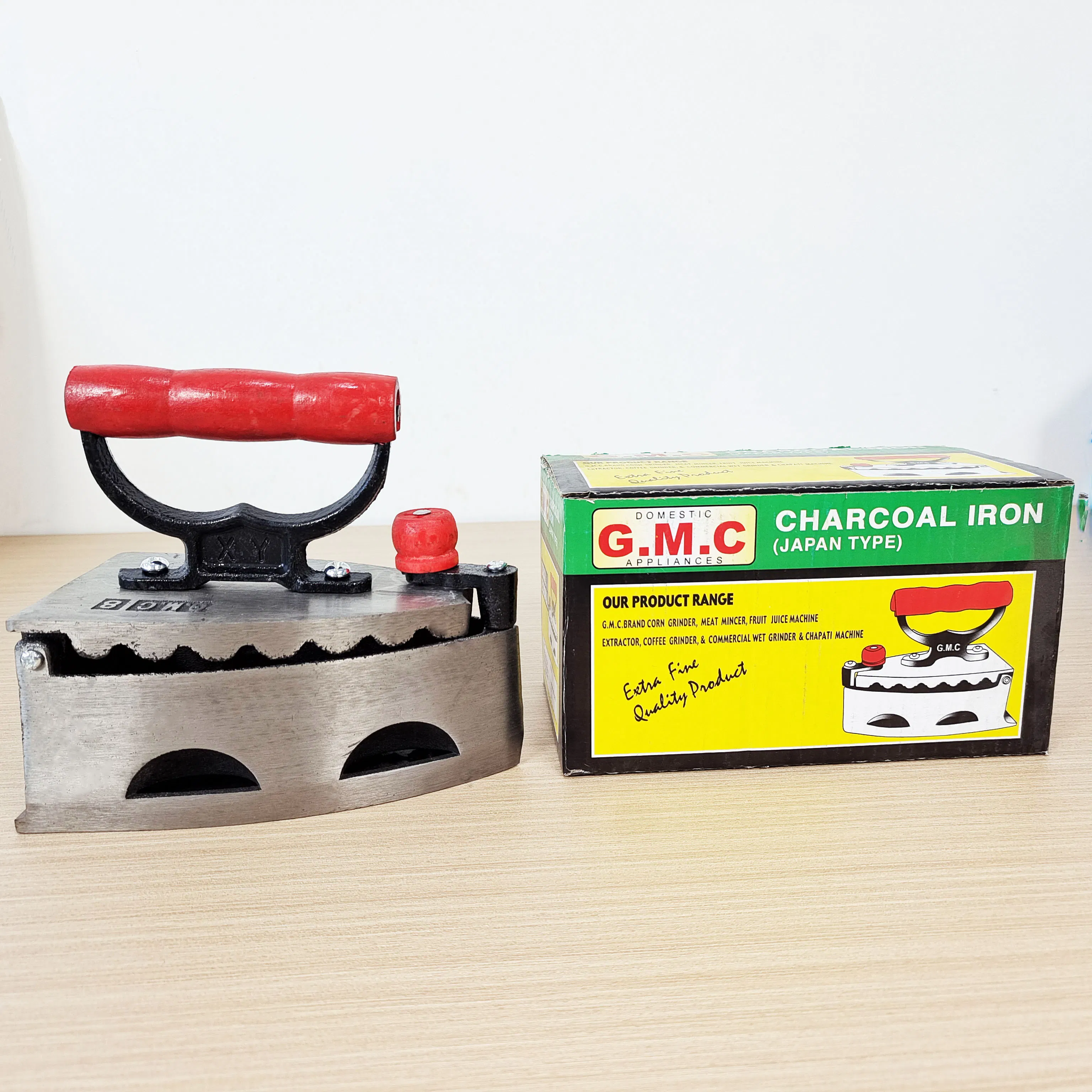 Classic Charcoal Iron with Red Wooden Handle for Everyday Use
