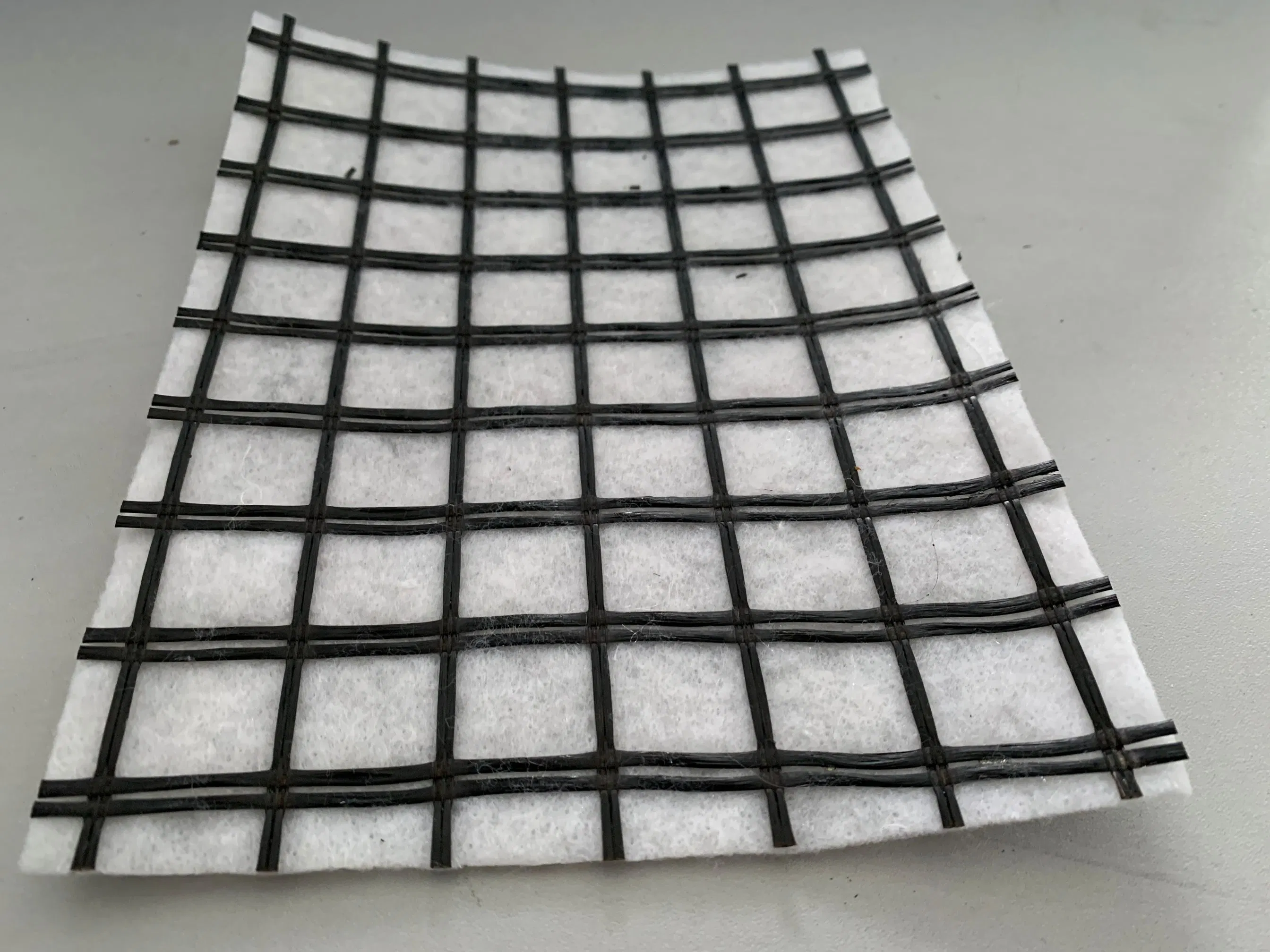 High Quality Asphalt Reinforcement Glassgrid Geocomposites for Asphalt Reinforcement/Fiberglass Geogrid Composite with Nonwoven Geotextile for Road