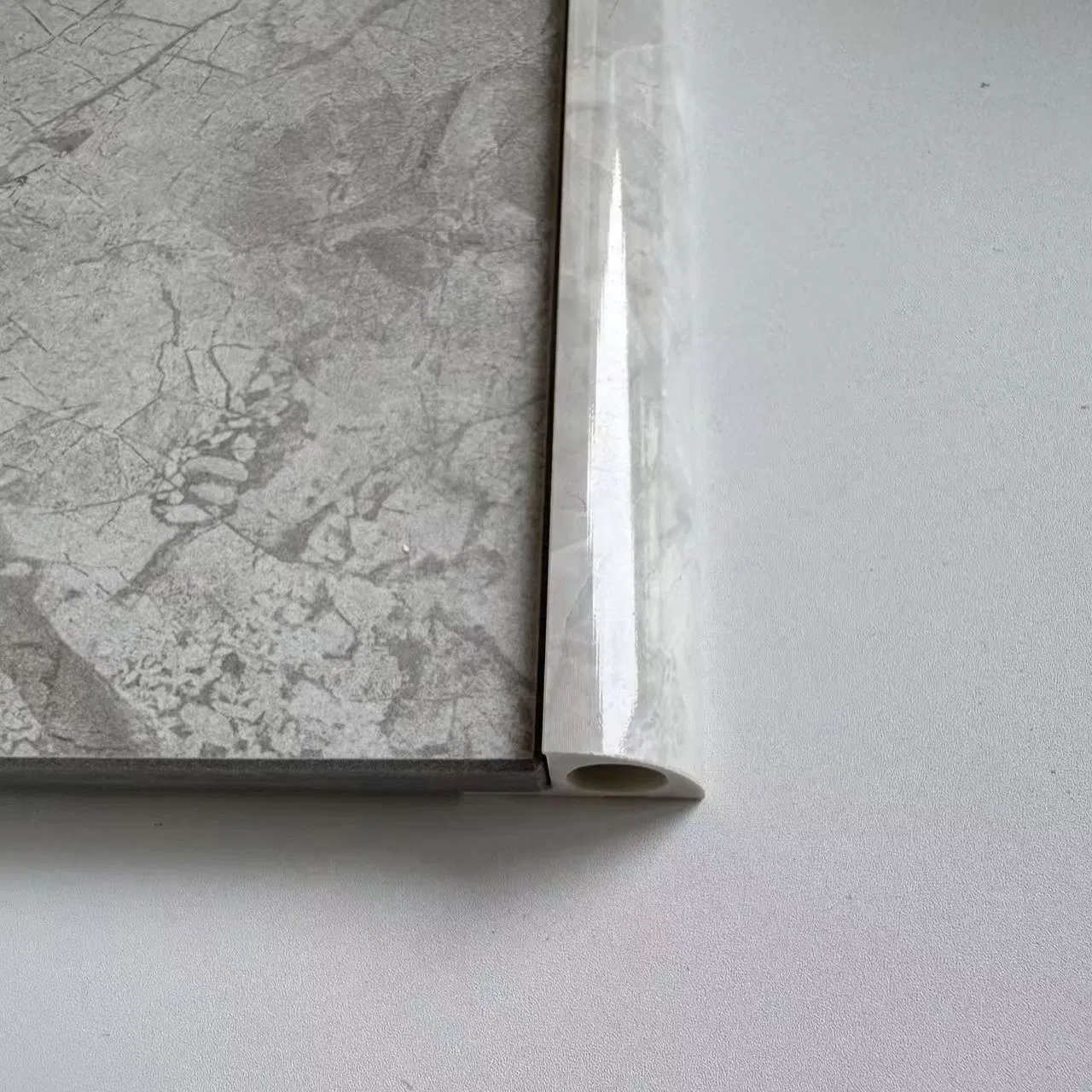 Modern Style Decorative Plastic Tile Edge Trim Round Corner Shape Stone PVC Ceramic Tile Trim for Edge Trimming Decoration