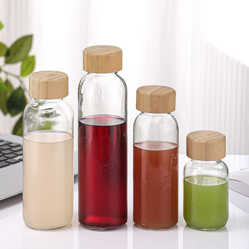 Стеклянная бутылка для воды с бамбуковой крышкой