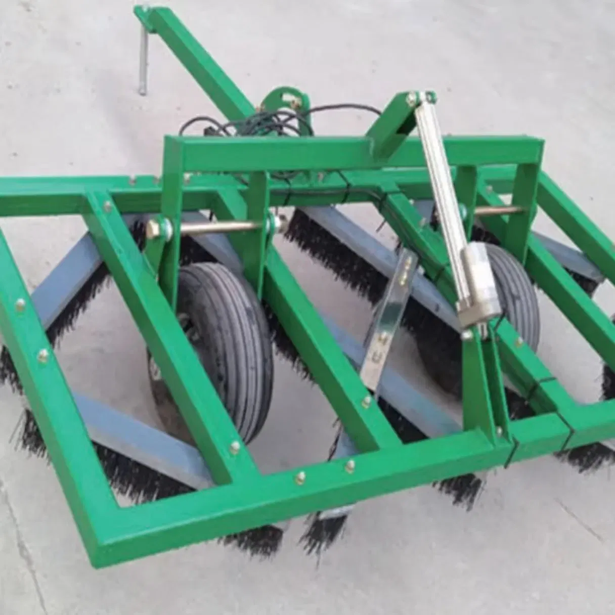 Adjustable Trailed Grass Brush for Efficient Lawn Debris Removal