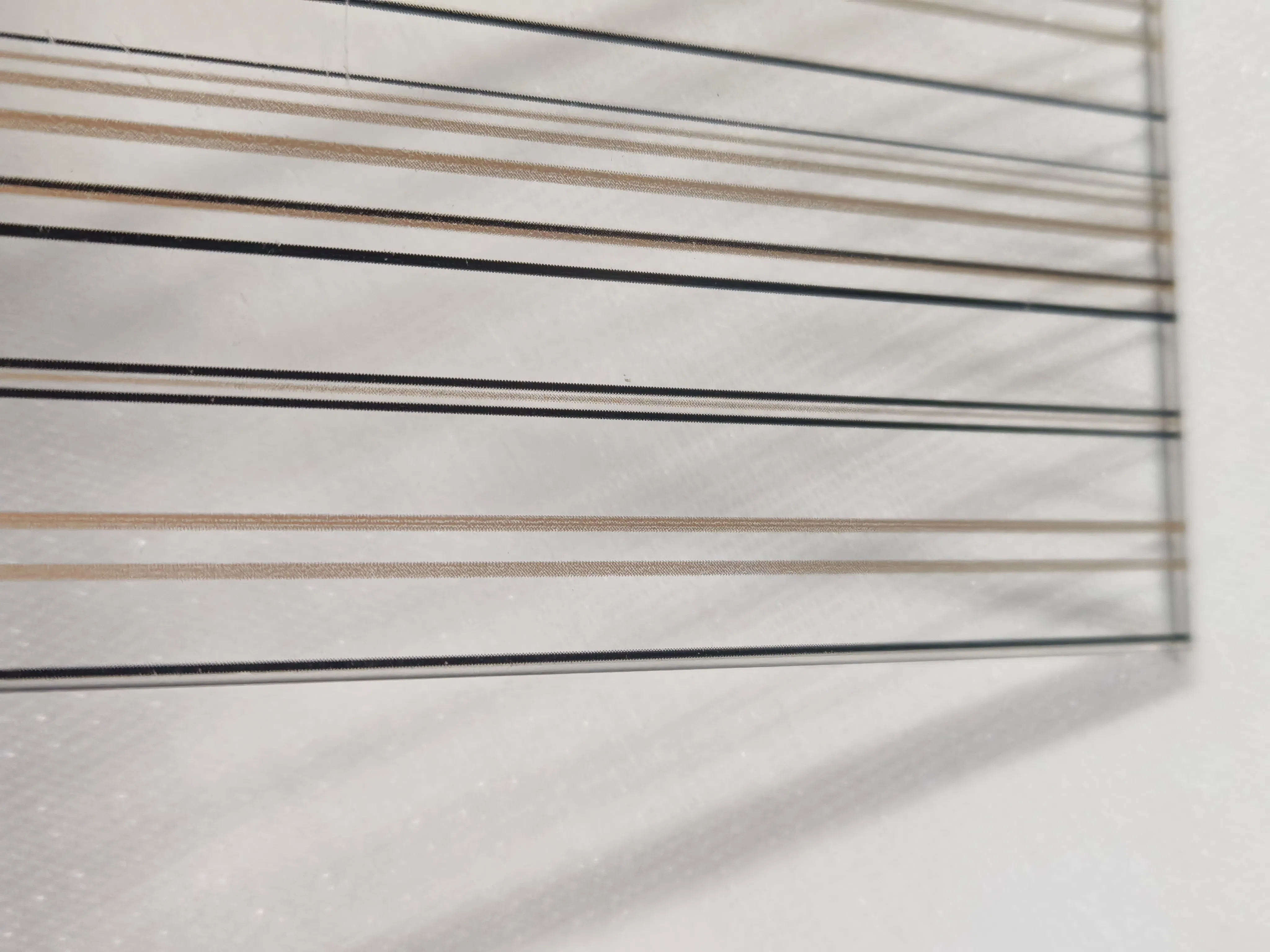 High-Quality Laminated Glass with Unique Artistic Fabric Touch