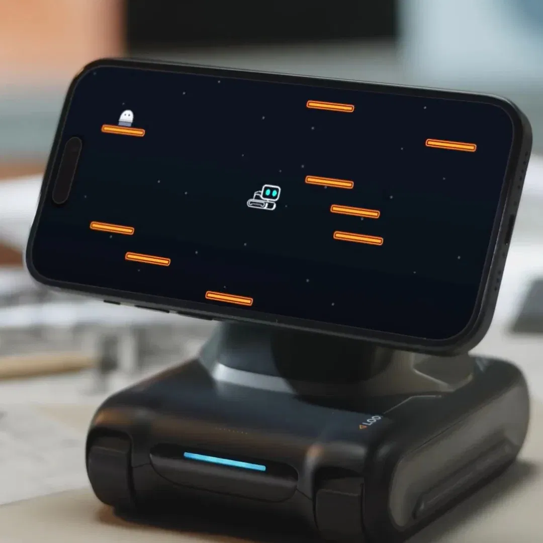 Moving Robot Stand with Cute Expressions Intelligent Phone Robot Dock – Looi Desktop Robot