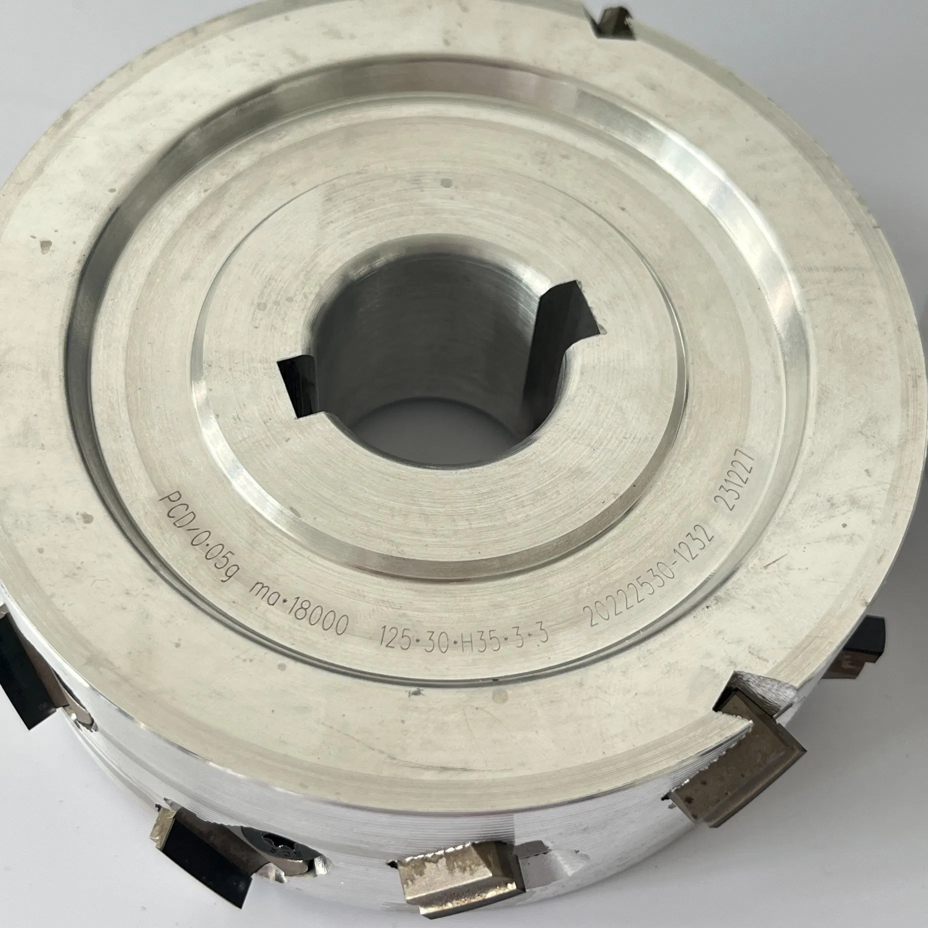 125X30xh35X3+3 Diamond Pre-Milling Cutter with Changeable Tips on CNC