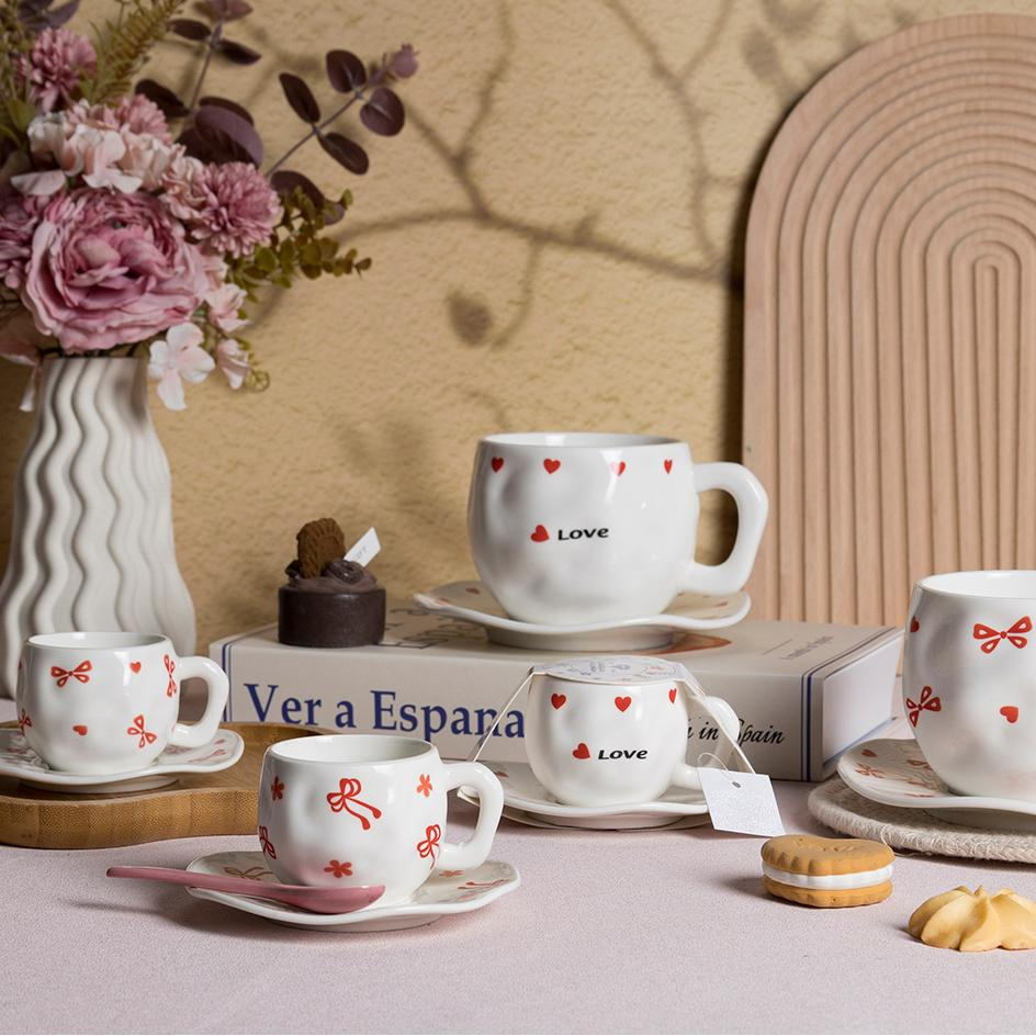 New Products Irregular Ceramic Tea and Coffee Cup with Saucer with Cute Love Heart Bow Design