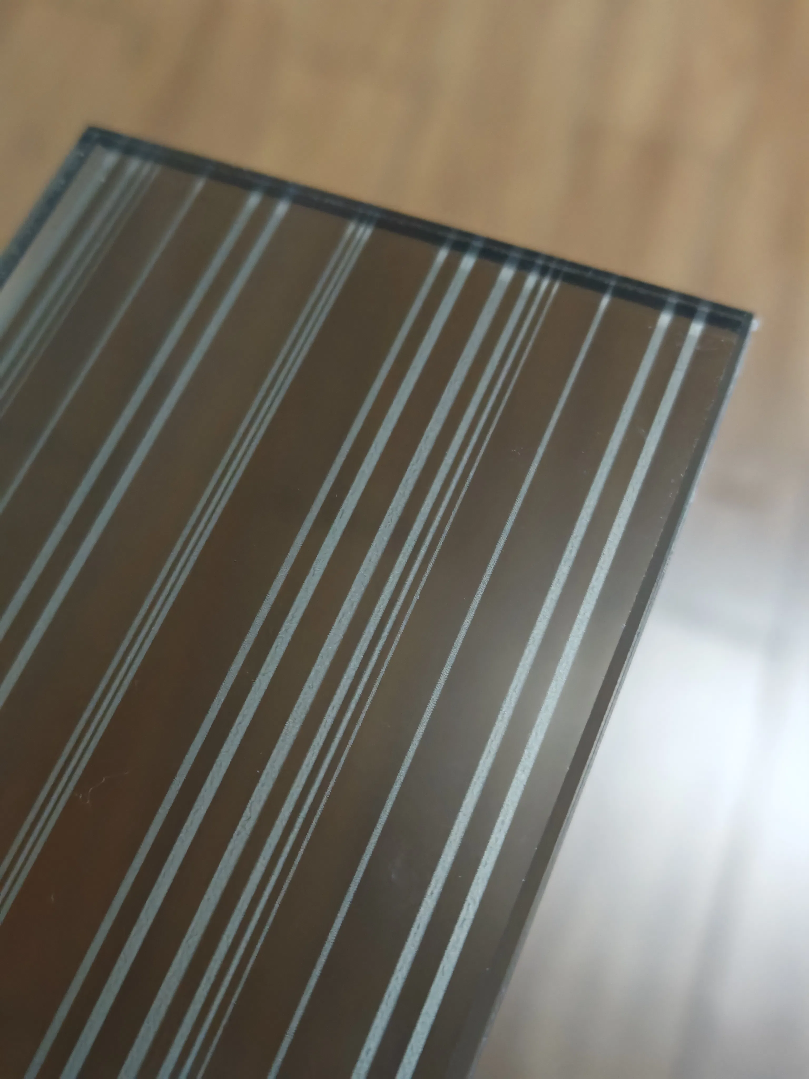 Elegant Laminated Glass Solutions with Artistic Fabric Touches