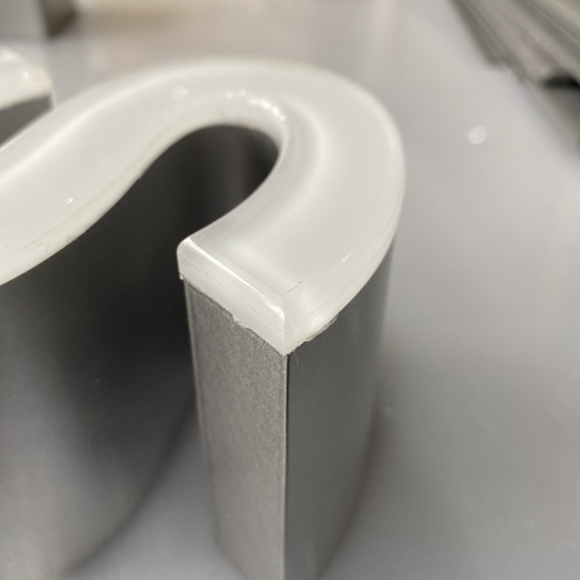 Edge-Lit Energy-Efficient Minimalist Channel Letter Sign for Decorative Artistic Installations