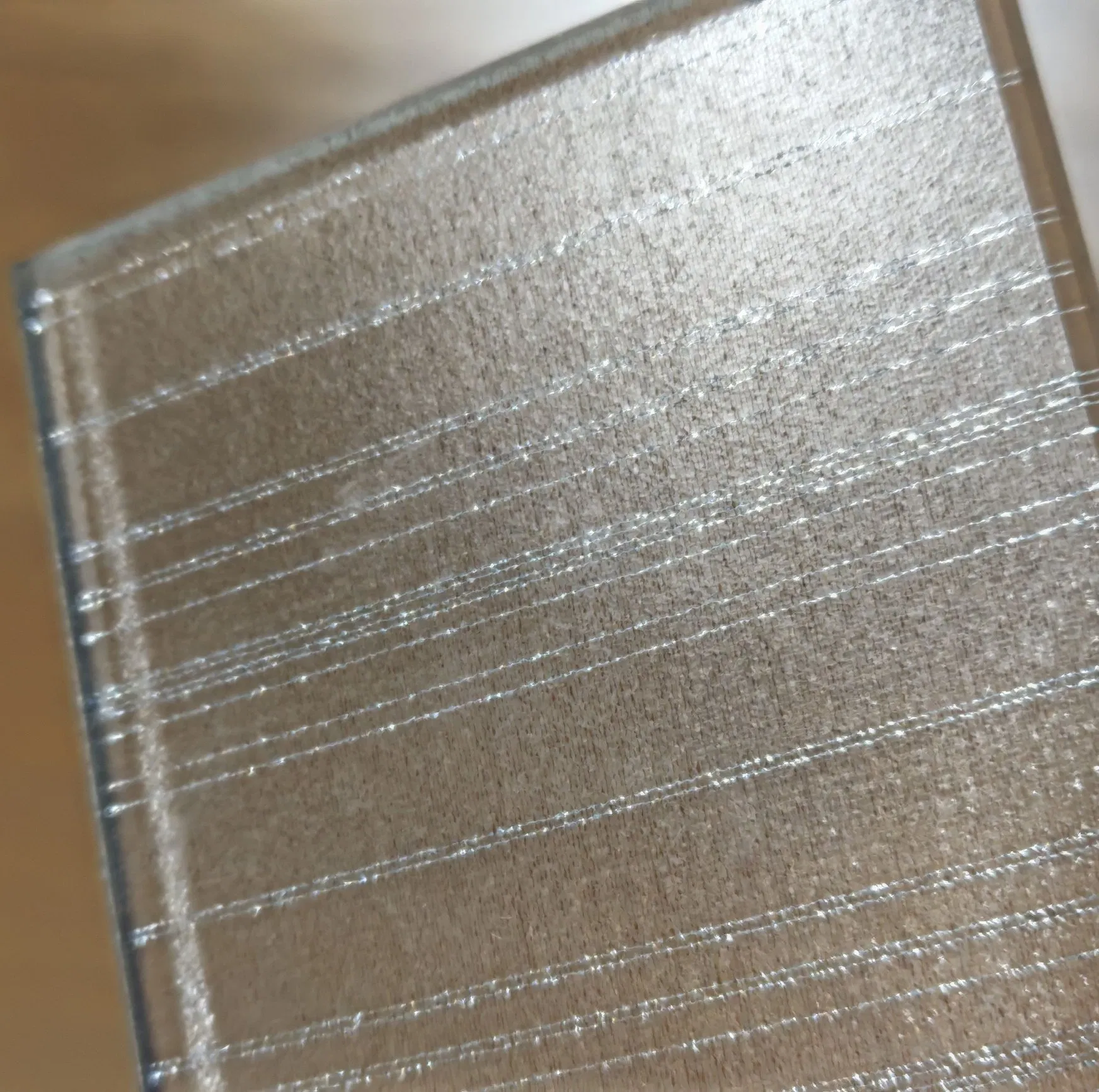 Elegant Laminated Glass Solutions Featuring Artistic Fabric Designs