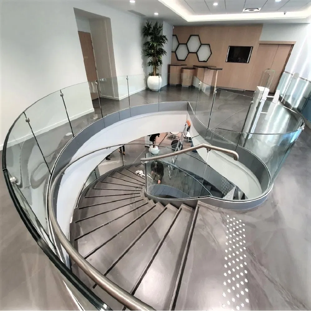 Customized Commercial/Villa Use Indoor Carbon Steel Glass Railing Curved Stairs with Glass /Marble/Wooden/Steel Step Option