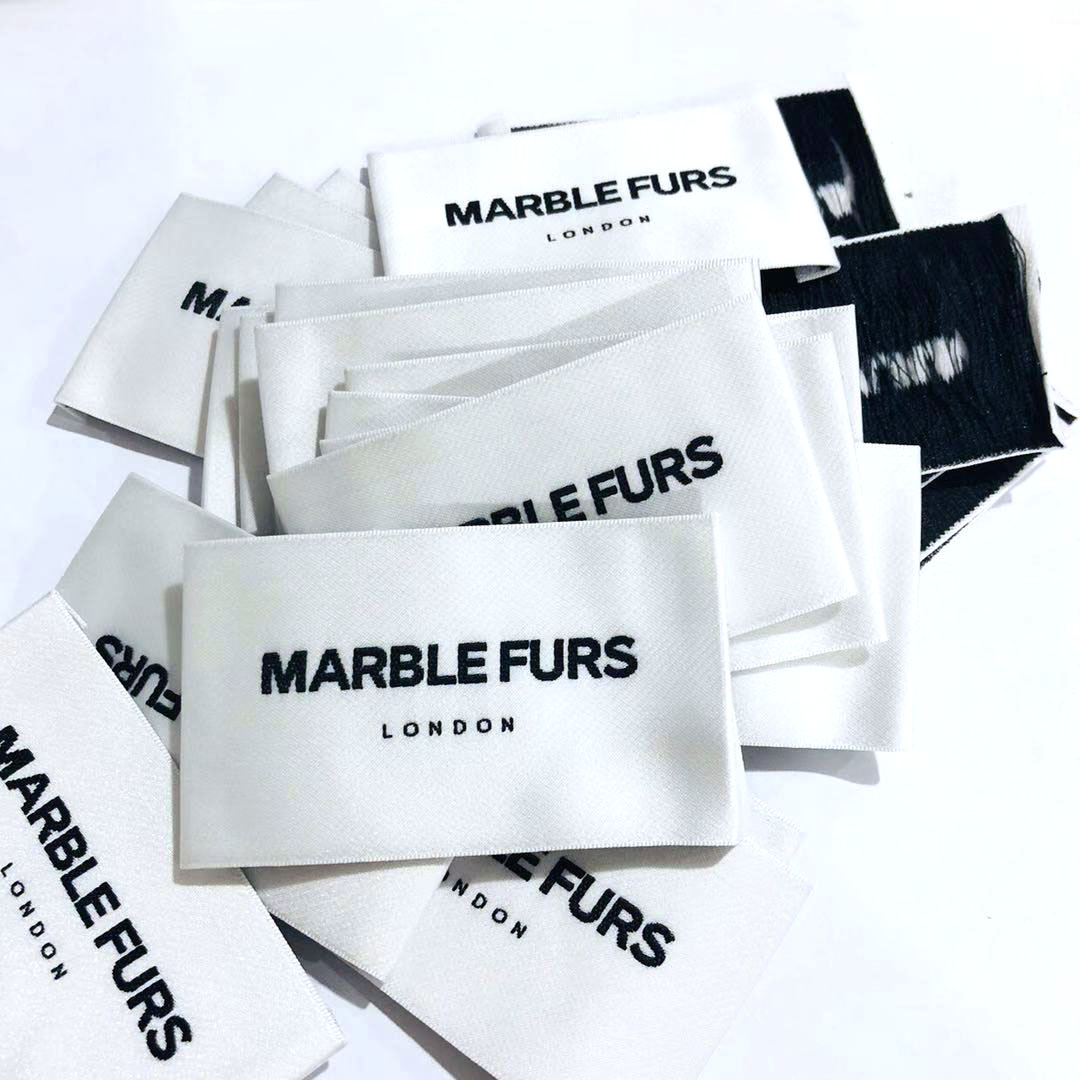 Этикетки тканые для одежды на заказ