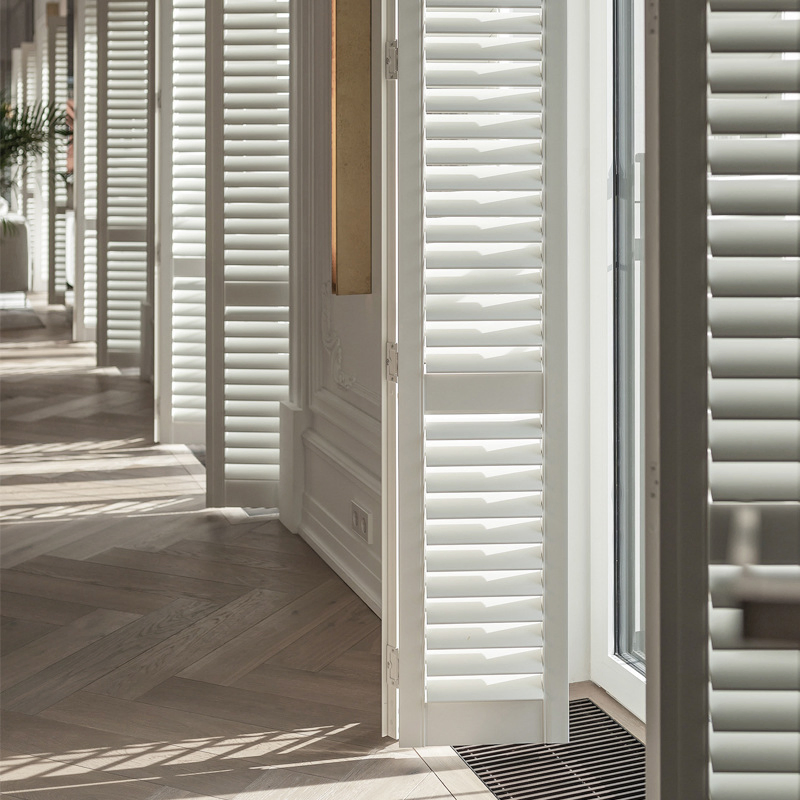 Elegant Wooden Louvre Shutters for Optimal Sun Control and Privacy