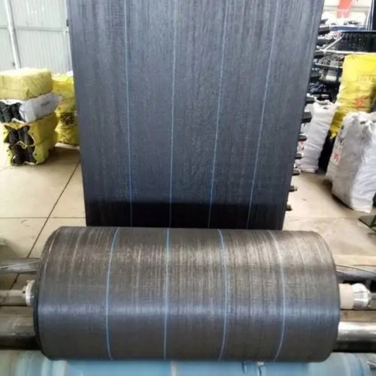 Grass Barrier Mat Landscape Fabric Ground Is Covered with The Grass Weed Barrier Fabric