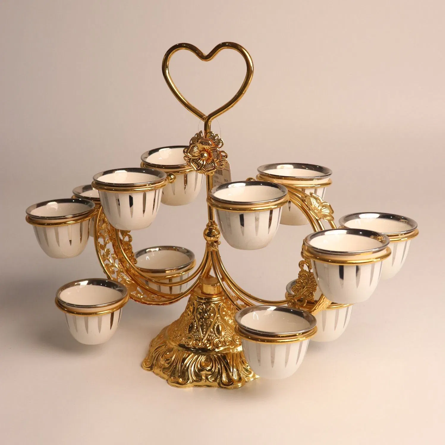 Ceramic Tea Cups and Golden Iron Holder for Tea Presentation Cups