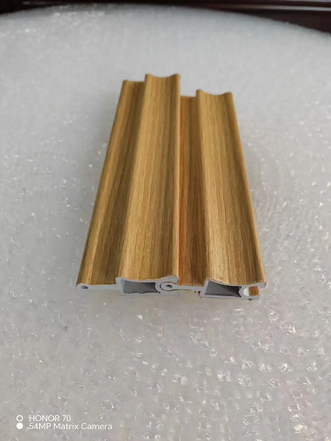 Cylindrical Rotating Grille WPC Board Wall Panel for Elegant Interiors