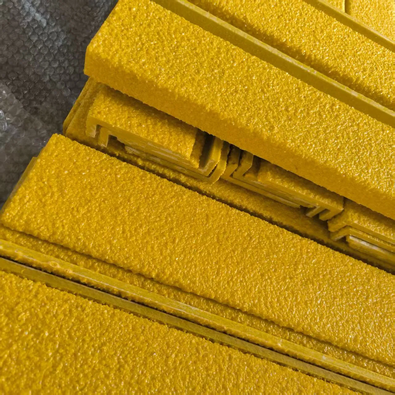 FRP/GRP Abrasive Stair Tread Nosings Installed on Tech-Shine T9 and T10 Steel Bar Grating Stair Treads