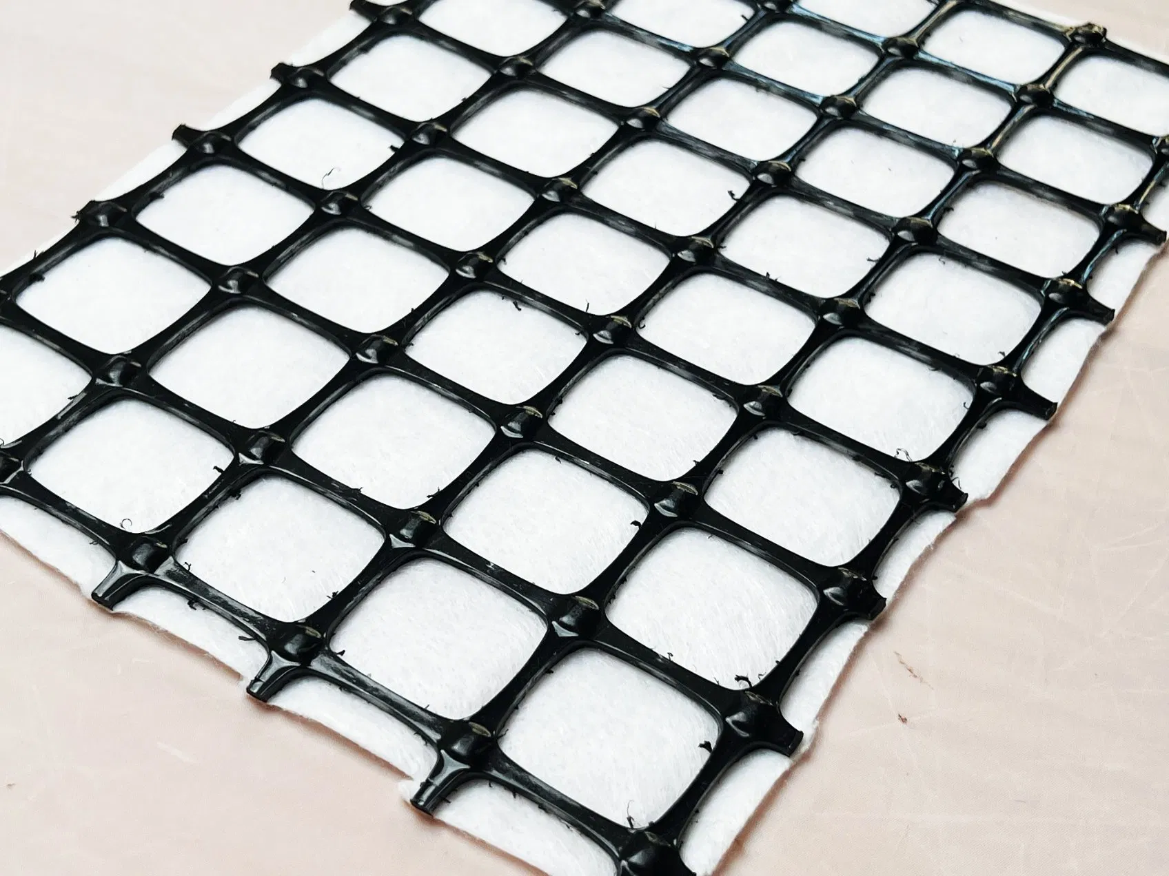 PP Biaxial Geogrid Composite with Pet Long Fiber Nonwoven Geotextile PP Staple Fiber Nonwoven Geotextile by Hot Heated