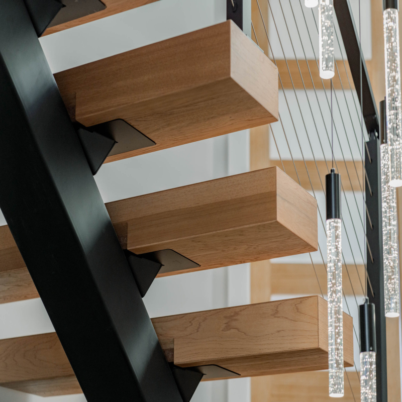 Premium Floating Staircase in Oak Finish with Frameless Glass Panels for Transparency