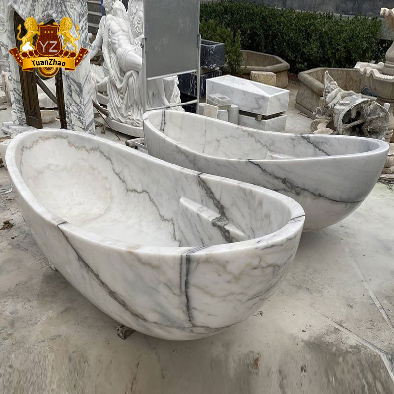 Белая мраморная ванна фристейдинг с гидромассажем