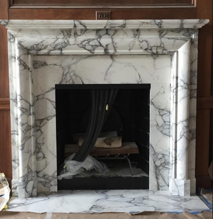 Elegant White Marble Fireplace with Classic Design for Homes