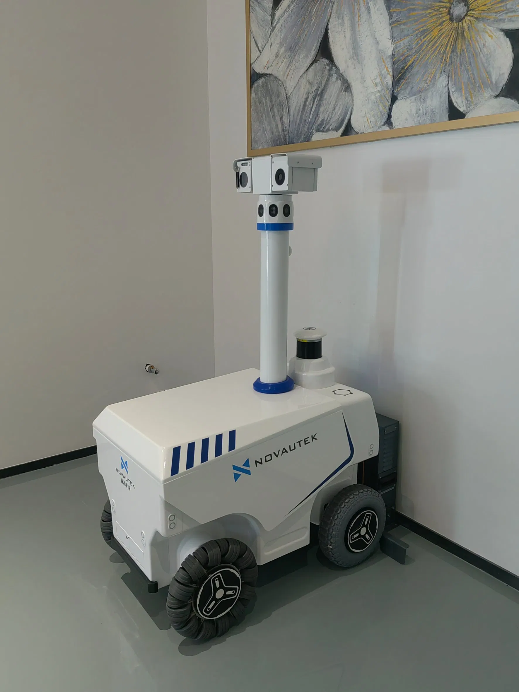 Multi-Role Outdoor Surveillance, Public Address, and Emergency Response Security Robot