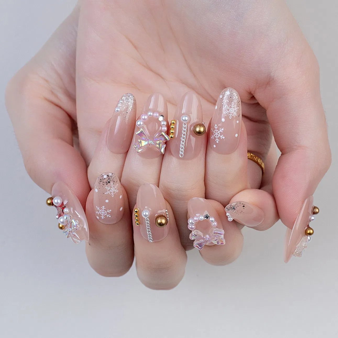 Nude Snowflake Bow Almond Press-on Nails (Christmas Pearl Design)