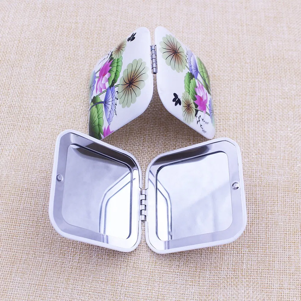 Elegant Metal Pocket Mirror with Reflective Cosmetic Surface