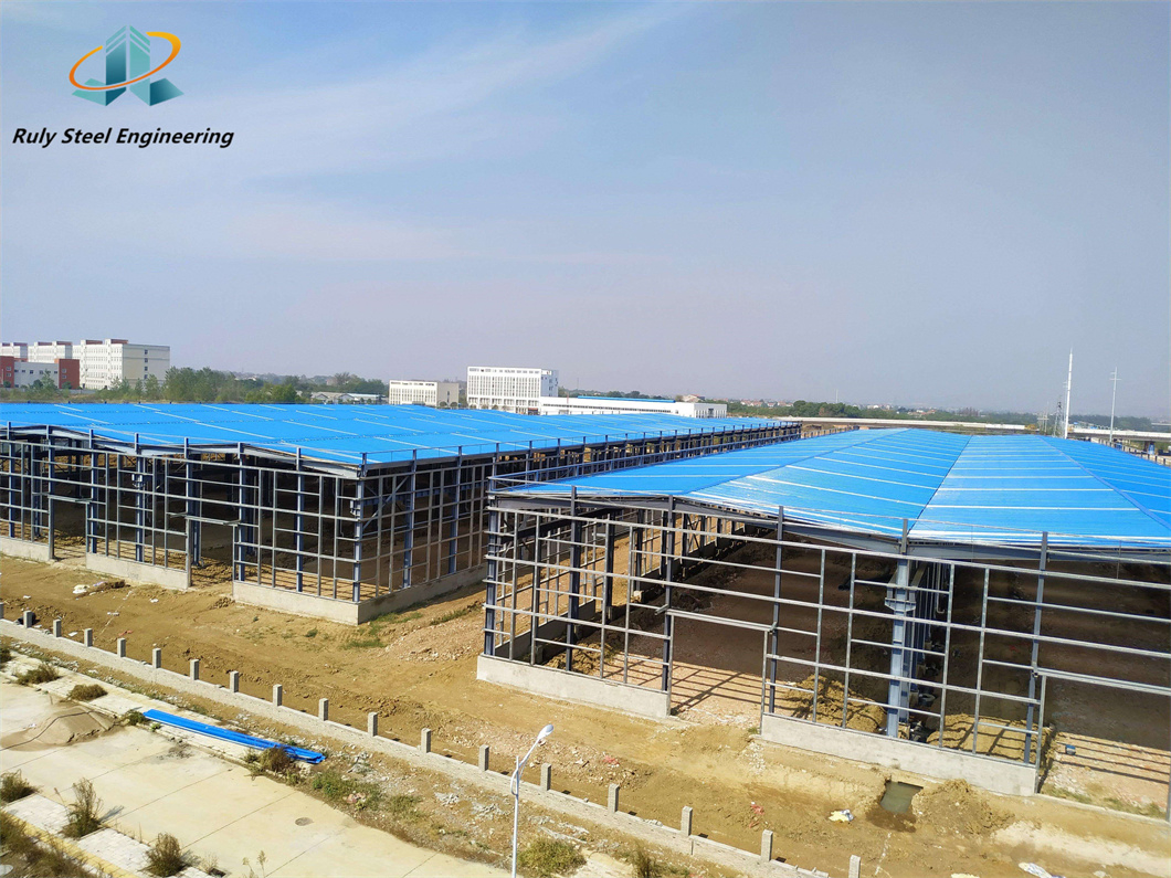 Prefab Pre-Engineered H Section Steel Multi-Span Large Indoor Space Wind/Seismic Resist Steel Structure Logistics Warehouse Building