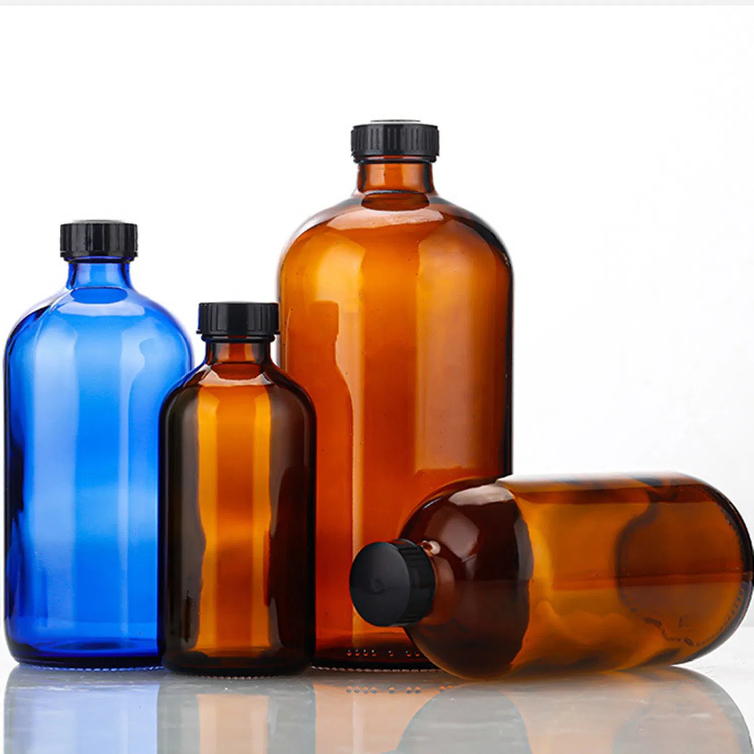 Стеклянные бостонские бутылки синие с черной крышкой