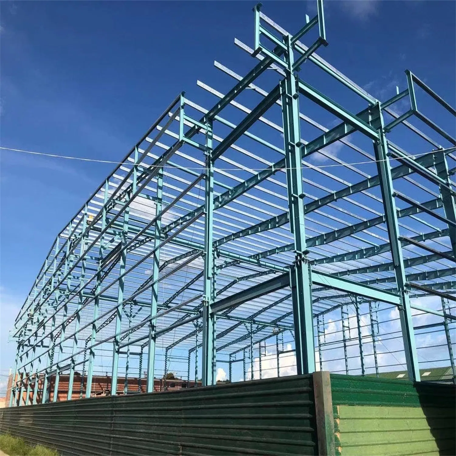 China Manufacture Industrial Galvanized Metal Prefabricated/Prefab Steel Structure Warehouse/Workshop/Construction Building Price for Storage/House