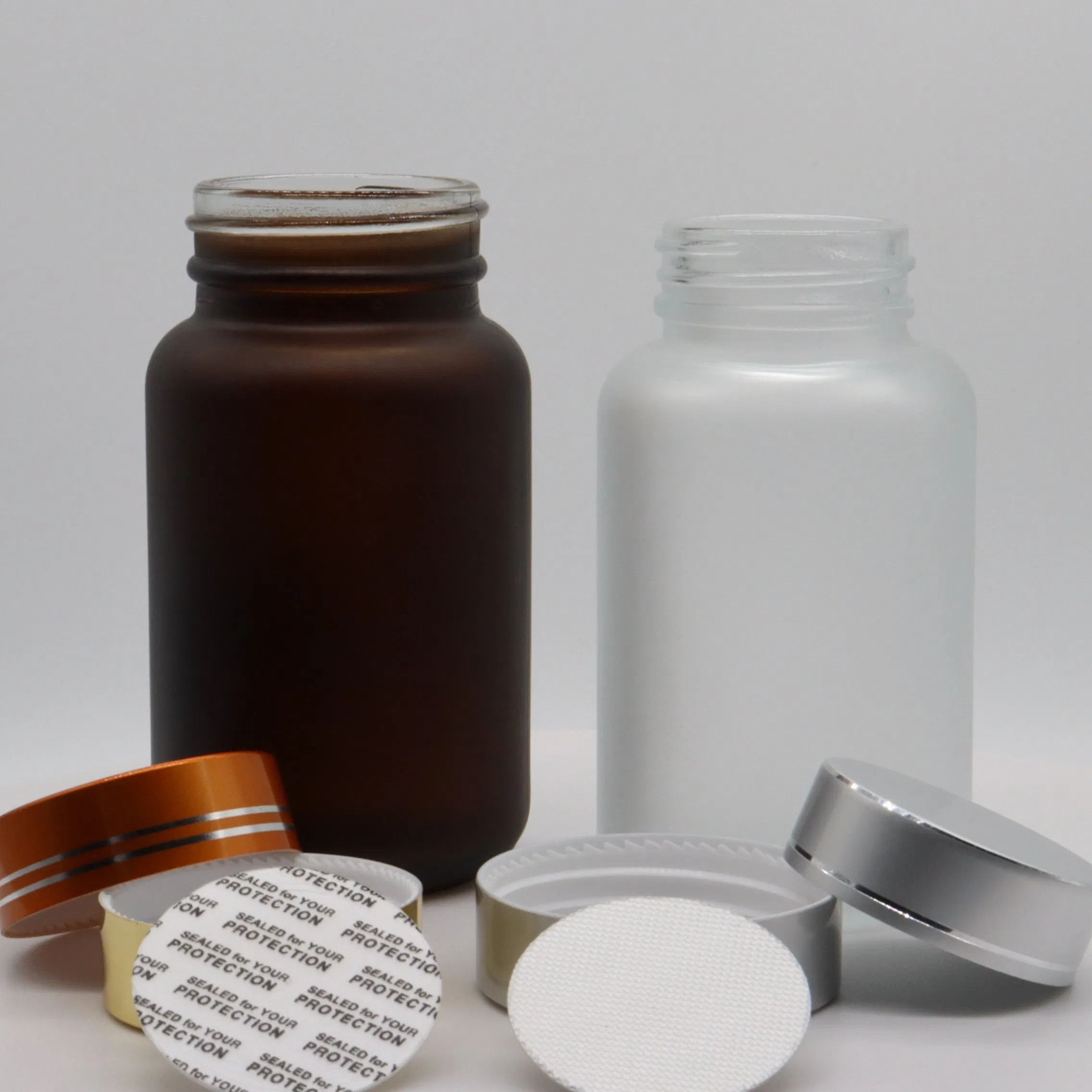 Food Grade Glass Jar Empty Transparent Glass Tablet Pill Capsule Bottles with Aluminum Caps Medicine Bottle Amber Green 100cc 200cc 500cc