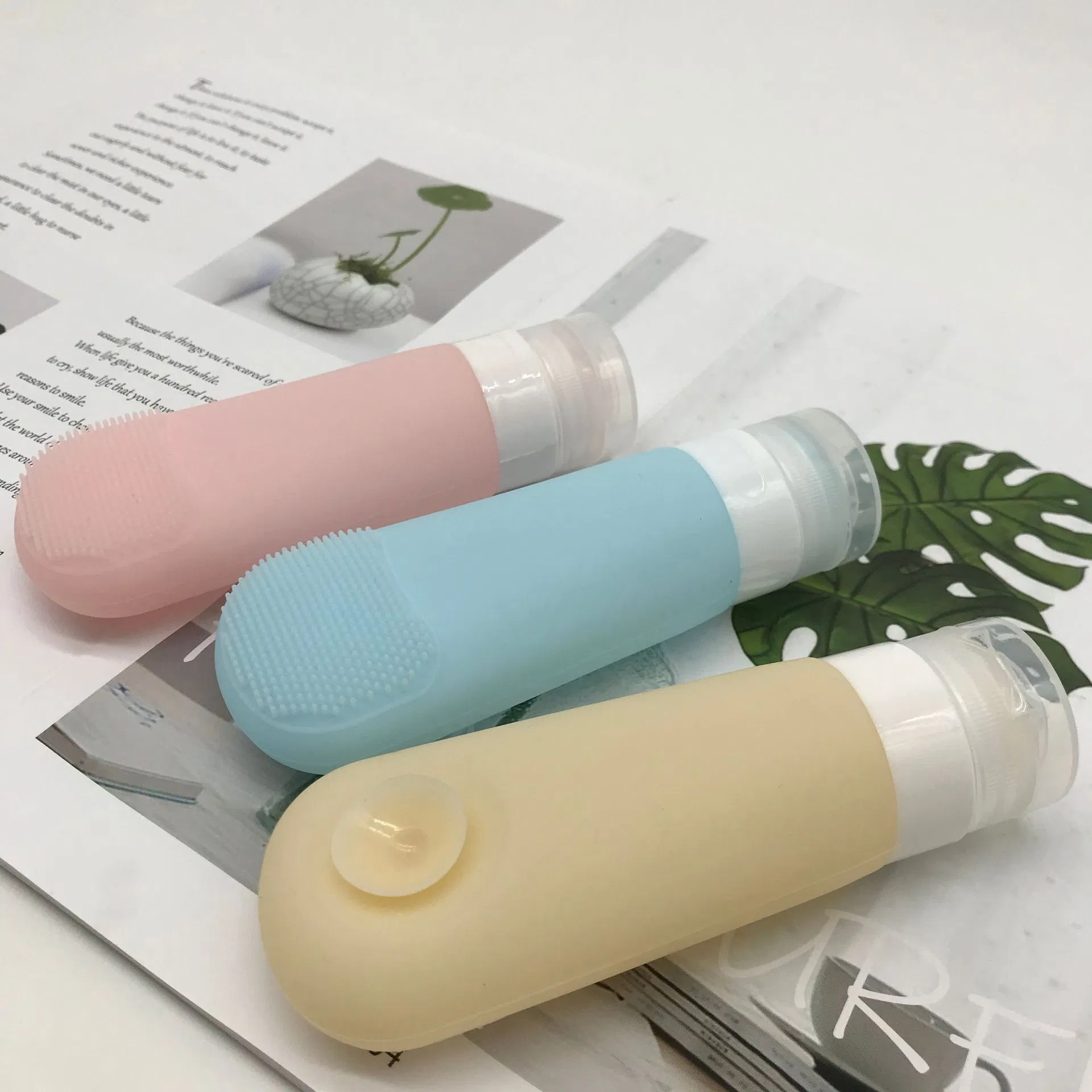 Portable Empty Travel Bottles for Toiletries with Suction and Cleaning Face Brush