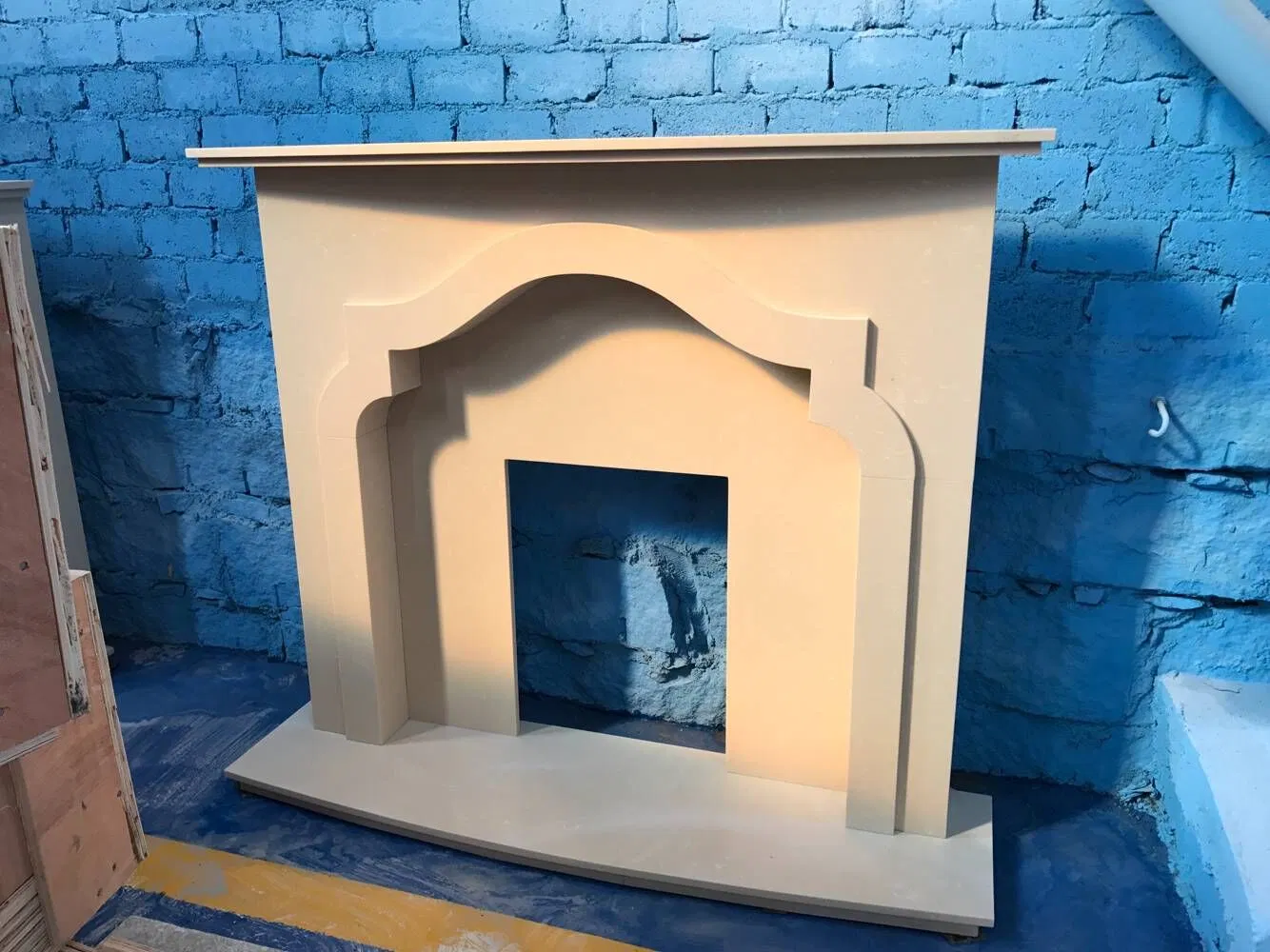 China Wholesale Interior Decoration Modern Style Hand Made Carved Artificial Stone Marble Fireplace Mantel Design Price