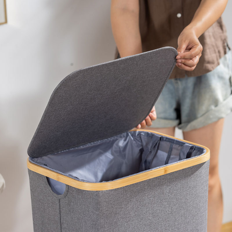 a Folding Bamboo Household Basket with a Lid and an Inner Bag for Storing Laundry Baskets